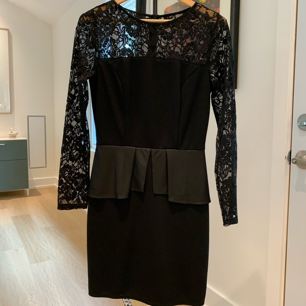 Black lace dress with peplum detail